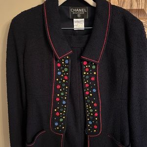 Authentic Chanel 1990s runway suit, boucle jacket and skirt.